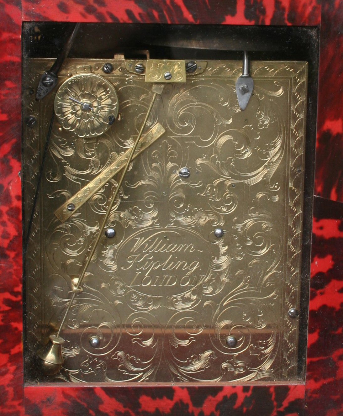 Engraved backplate of the movement, clock made by William Kipling